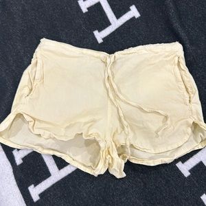 Brandy Melville pastel yellow shorts
